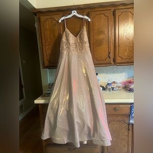 Prom Dress from David’s Bridal, size 20W, it’s rose gold & it really shines! :)
